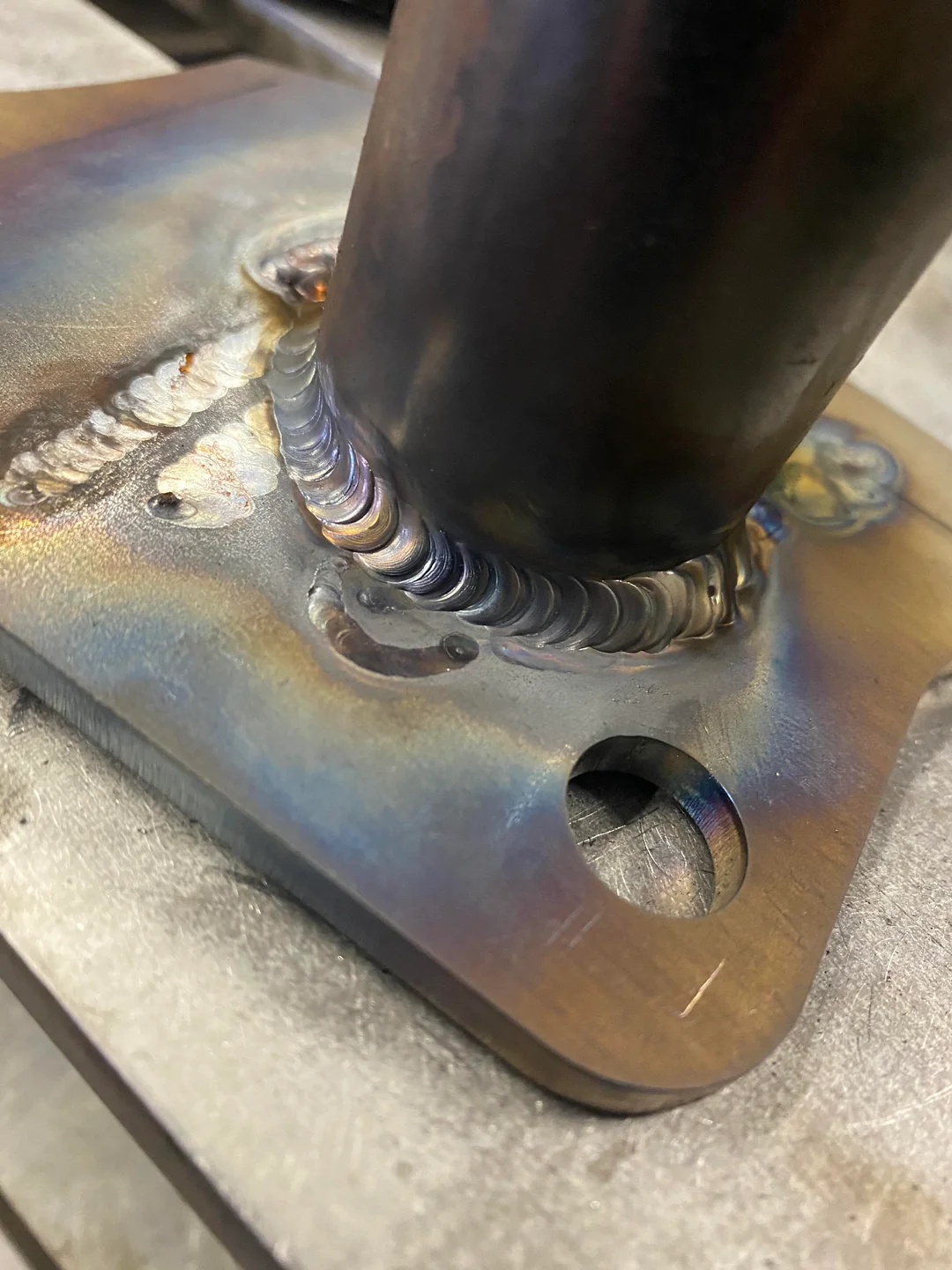 Round tube welded to a base plate