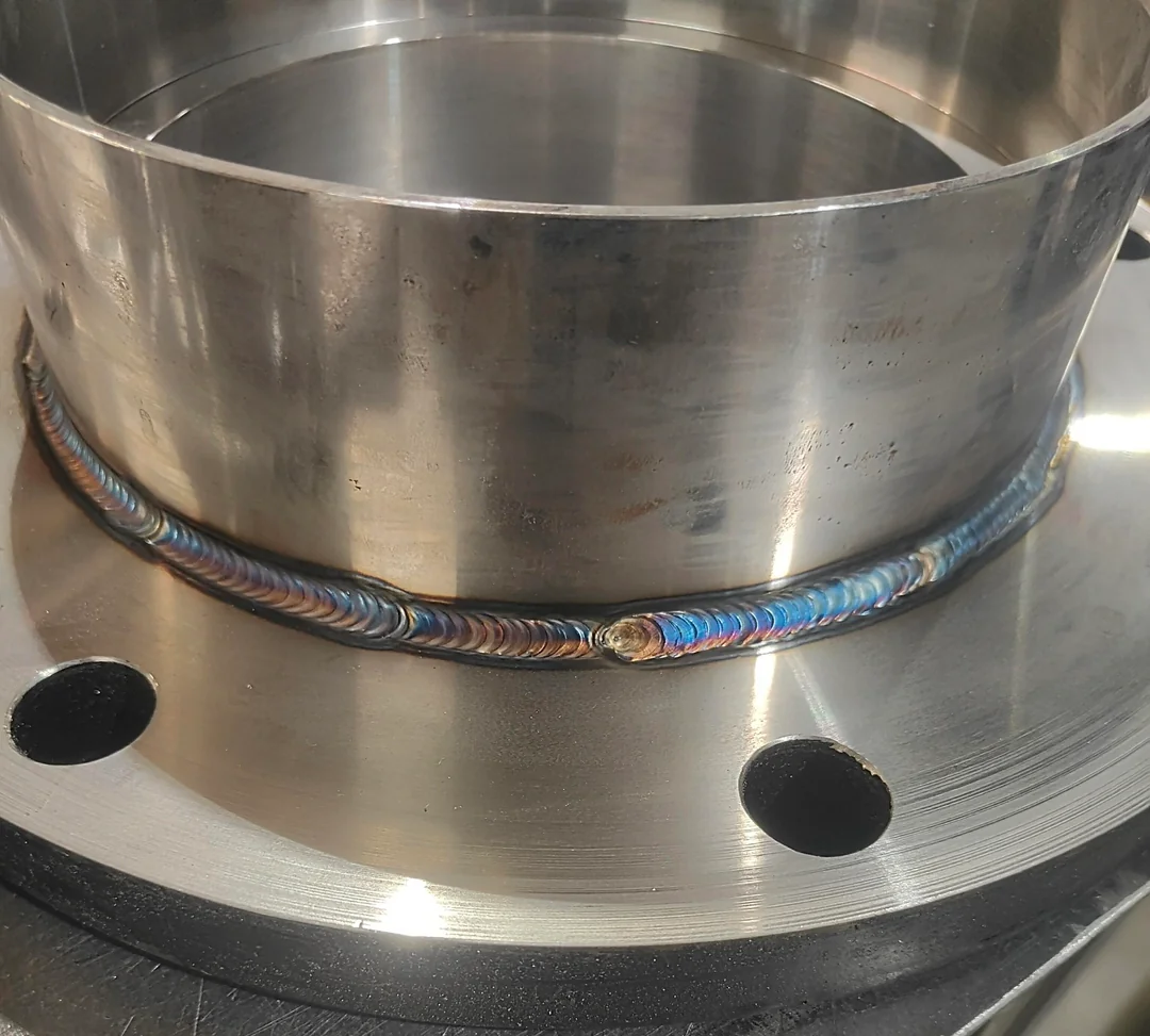 Stainless steel pipe welded to a flange